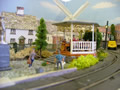 The park and bandstand, with windmill in the background
